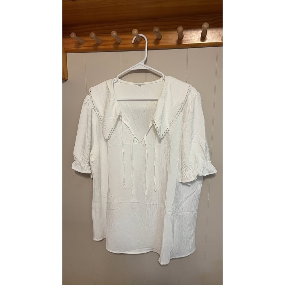 White Lace-Trimmed Blouse with Tie Details